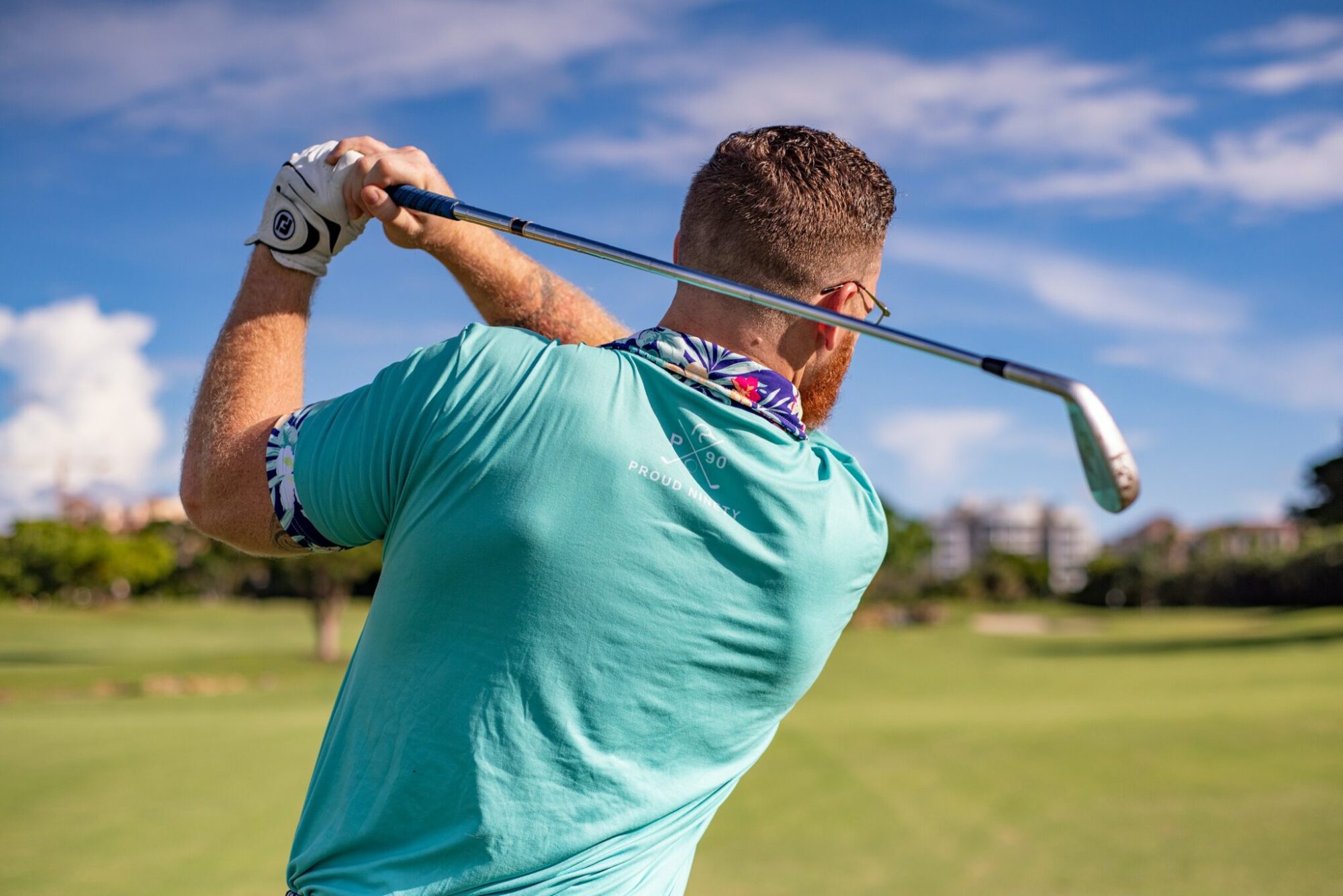 Man enjoying a round of golf on a beautiful day