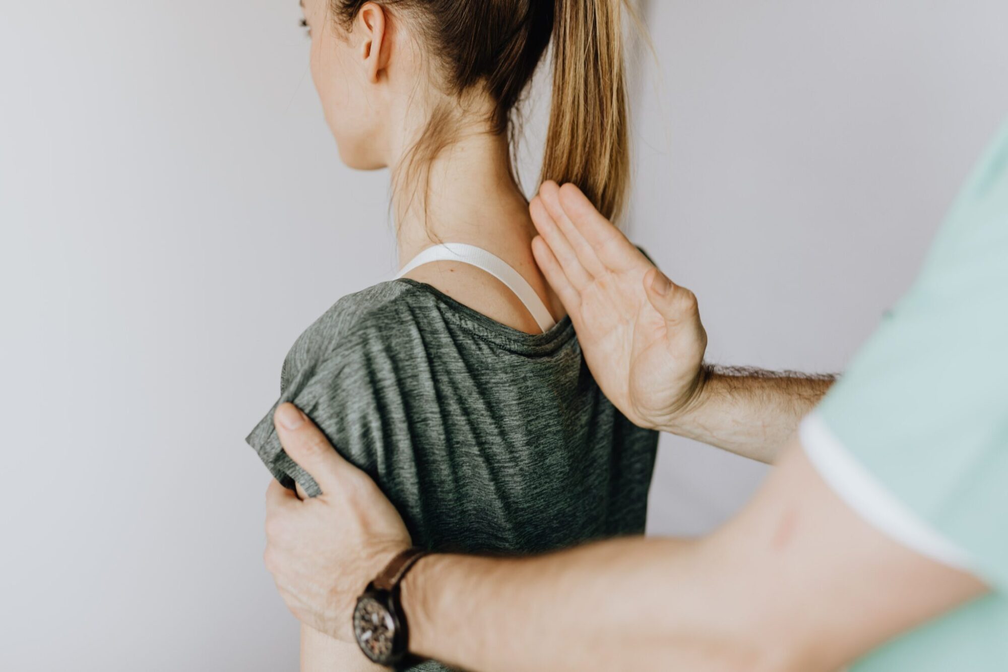 Woman receiving chiropractic care for a pain free life